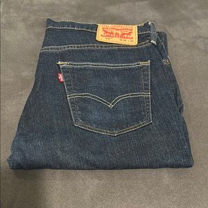 Levi's Blue Straight Jeans with Distinctive Red Tab and Iconic Stitching
